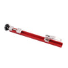 A precision adjustable circular saw guide rail with a red body and silver adjustment components.