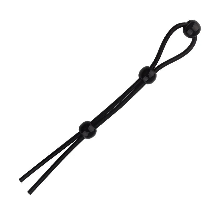 Black silicone erection enhancer ring with a thin, flexible band and two prongs.