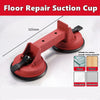 A red floor repair suction cup tool with a handle and suction disc is shown against a white background.