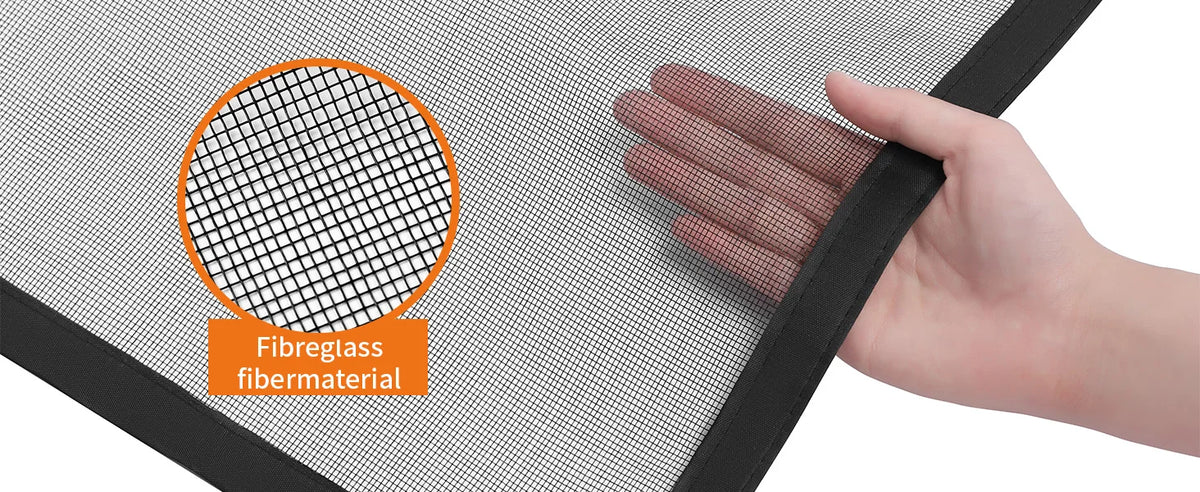 A hand is touching a mesh fiberglass door screen, highlighting the fine grid structure.
