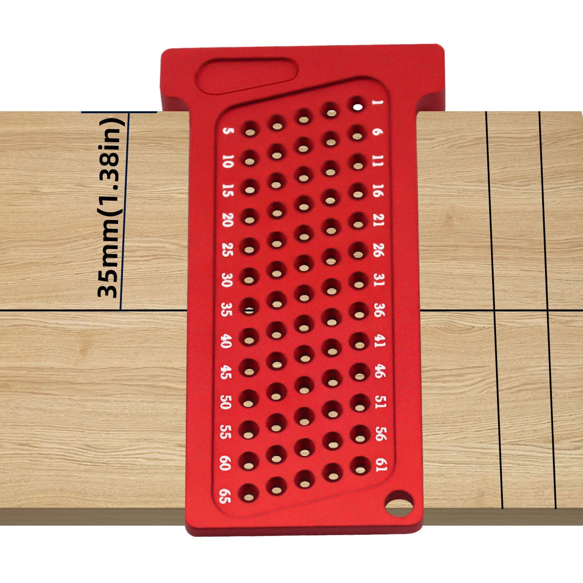 A red precision T-square ruler with numbered markings is shown resting on a wooden surface.