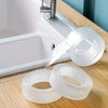 Rolls of heavy duty transparent double-sided adhesive tape next to a white sink fixture.