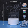 A white decorative night light featuring a heart design and text, shown with dimensions.