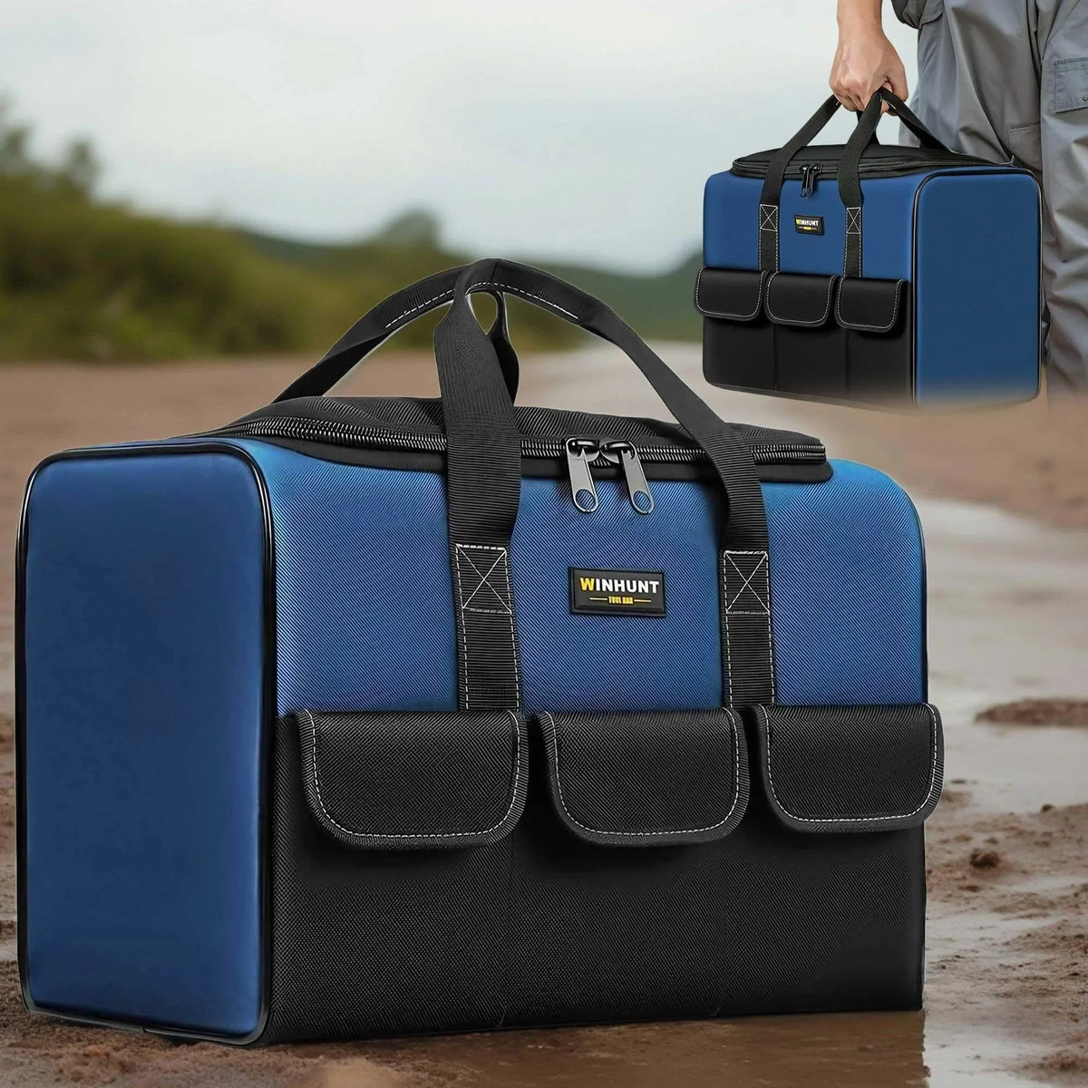 A blue and black heavy duty multi-compartment tool organizer bag is shown being held by a hand.