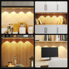 Modern kitchen and wardrobe interior showing illuminated cabinets with motion sensor LED night lights.