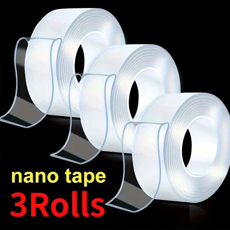 Tres rollos de cinta adhesiva nano transparente mostrados contra un fondo negro.