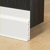 White door draft stopper weather stripping seal installed against a dark wood surface.