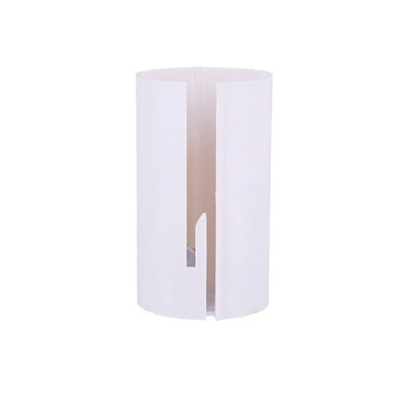 A white sliding wrapping paper cutter with a visible cutting blade.