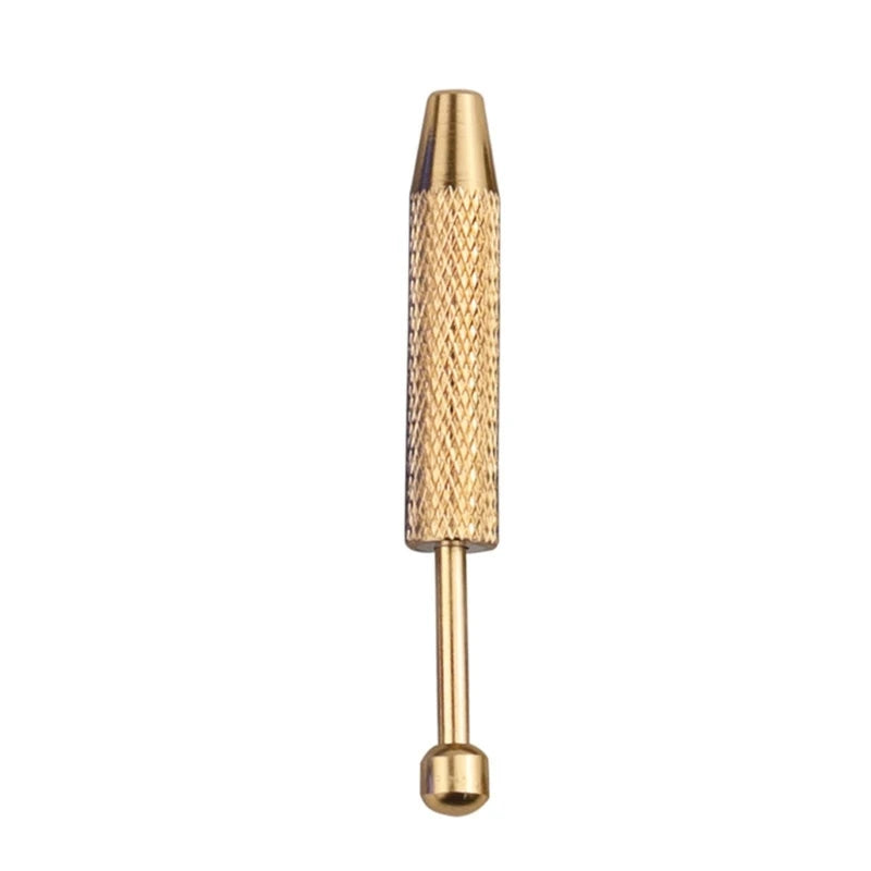 A brass precision diamond setting tool with a textured body and a pointed tip.