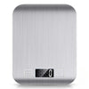 A silver digital kitchen scale with a rectangular design and a display showing 18.60 grams.