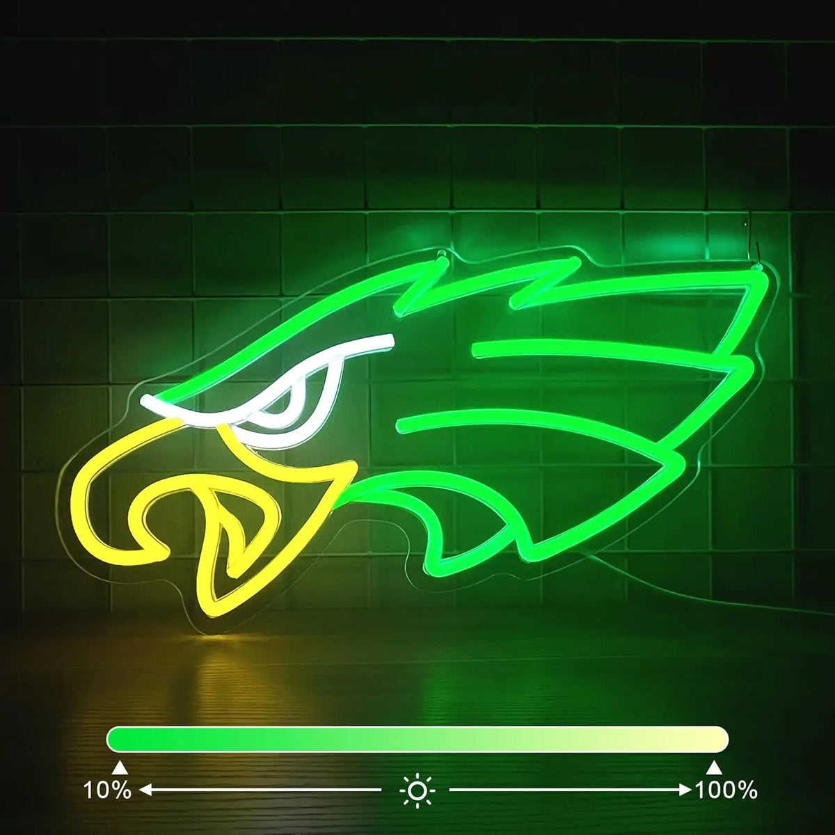 A neon sign shaped like an eagle in yellow and green outlines against a dark green tiled wall.