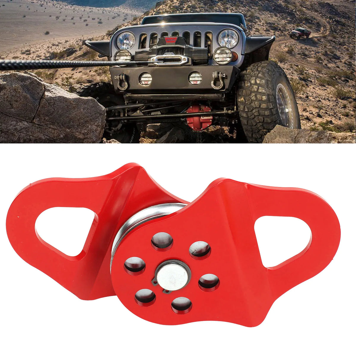 Red heavy duty winch snatch block with mounting holes and a handle