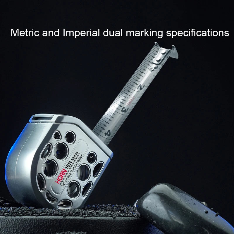 A silver metric and imperial dual marking tape measure is shown against a dark background.