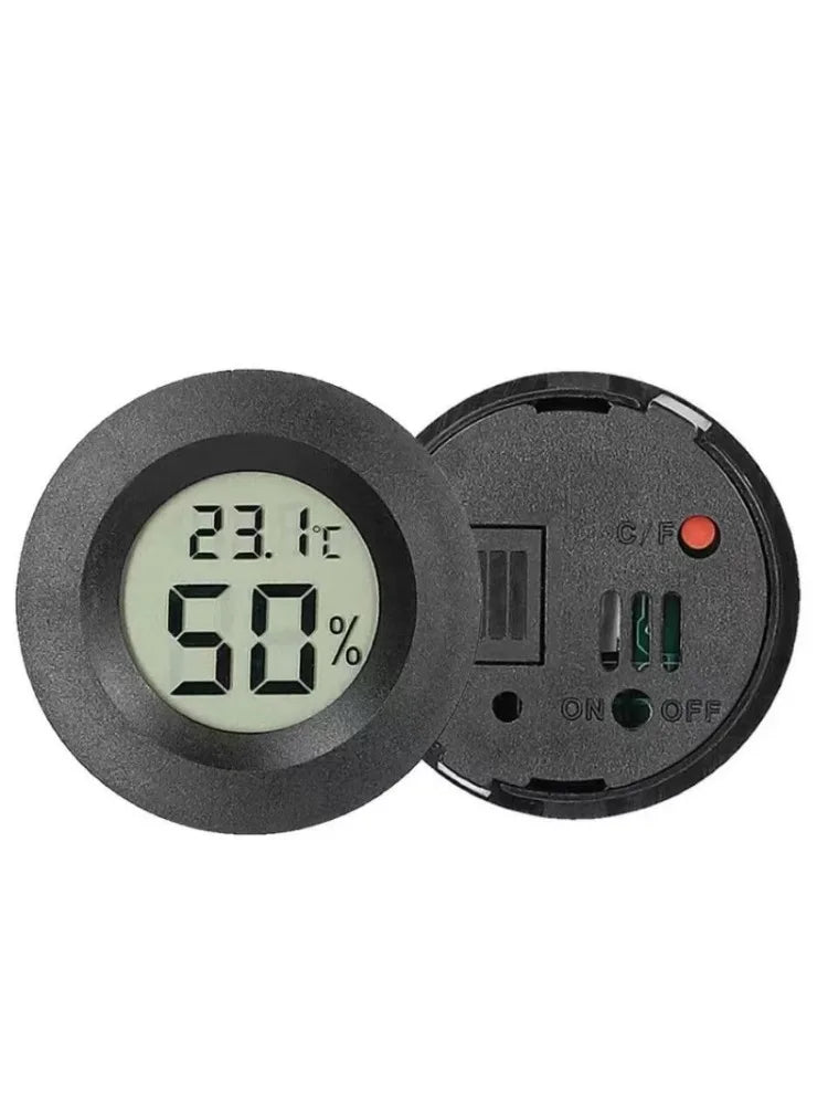 A black digital indoor humidity and temperature meter displaying 23.1°C and 50% humidity.