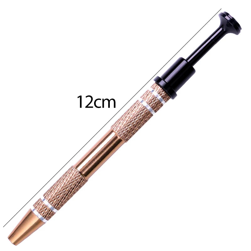 A close-up view of a precision 4-prong gem and small parts grabber tool with a gold-toned handle and black tip.