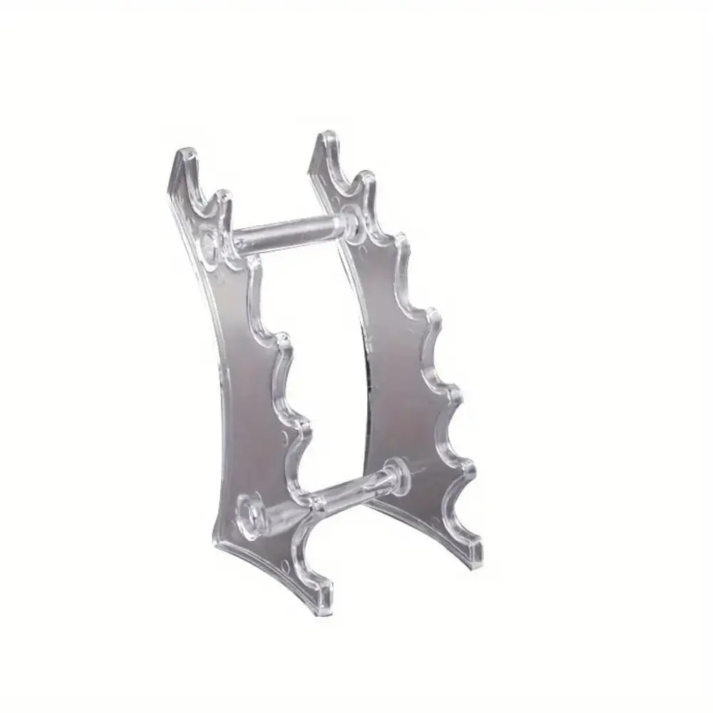 Clear plastic ballpoint pen holder organizer with a decorative, leaf-like design.