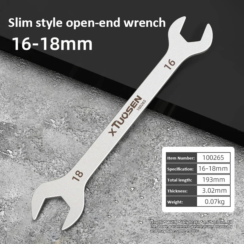 A silver slim style open-end wrench measuring 16-18mm, shown against a gray background.