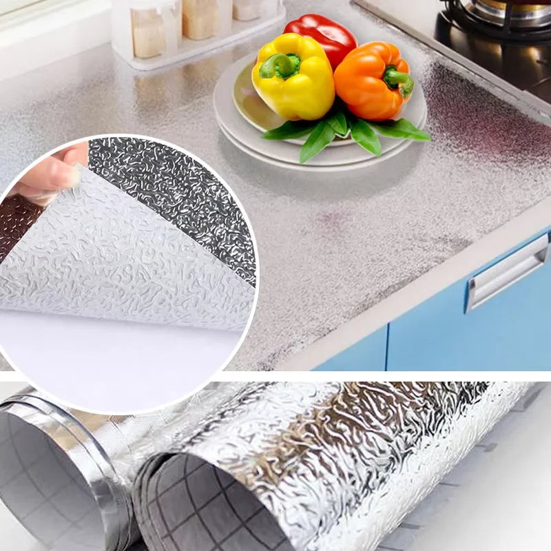 Self-adhesive aluminum foil contact sheets showing various decorative patterns and food items