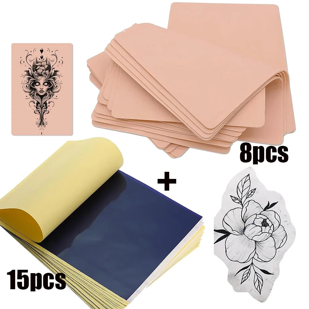 A set of professional tattoo practice skin and transfer kits including pink sheets and a blue sheet with floral designs.