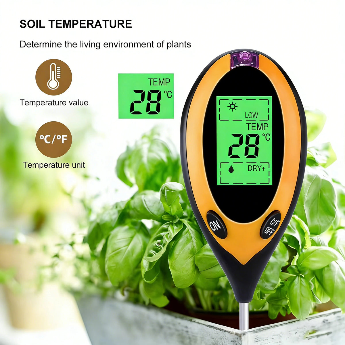 An orange soil temperature meter displays 28 degrees Celsius, measuring the living environment of plants.