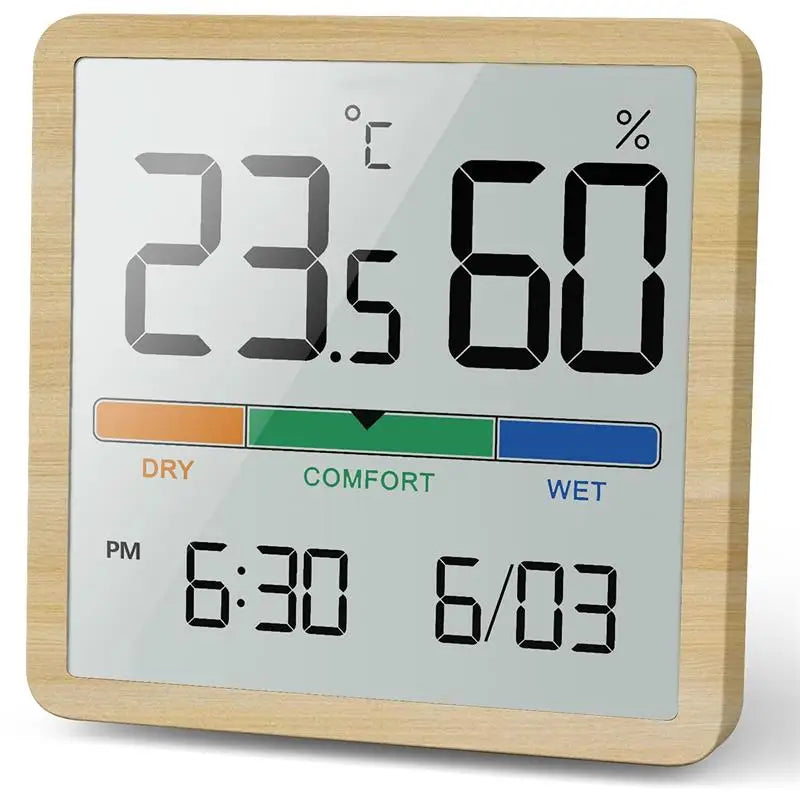 A wooden digital indoor thermometer and hygrometer displaying 23.5°C and 60% humidity.