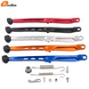 A set of motorcycle side stand kickstand components including various metal bars, springs, and bolts.