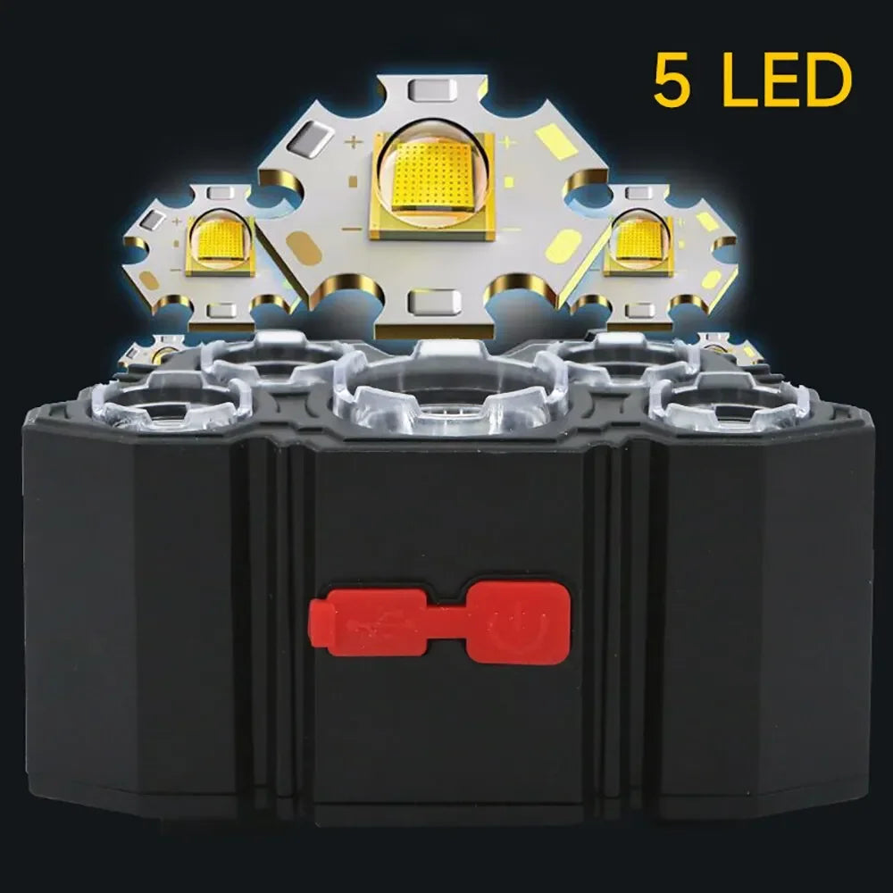 A black battery pack with five yellow LED lights mounted on top.