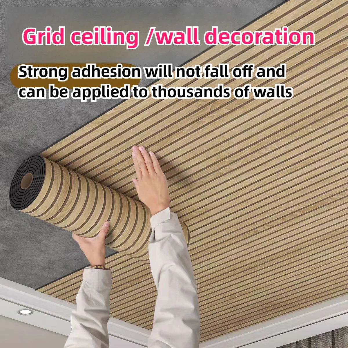 Roll of wood grain grid ceiling and wall decoration material being applied to a wall.