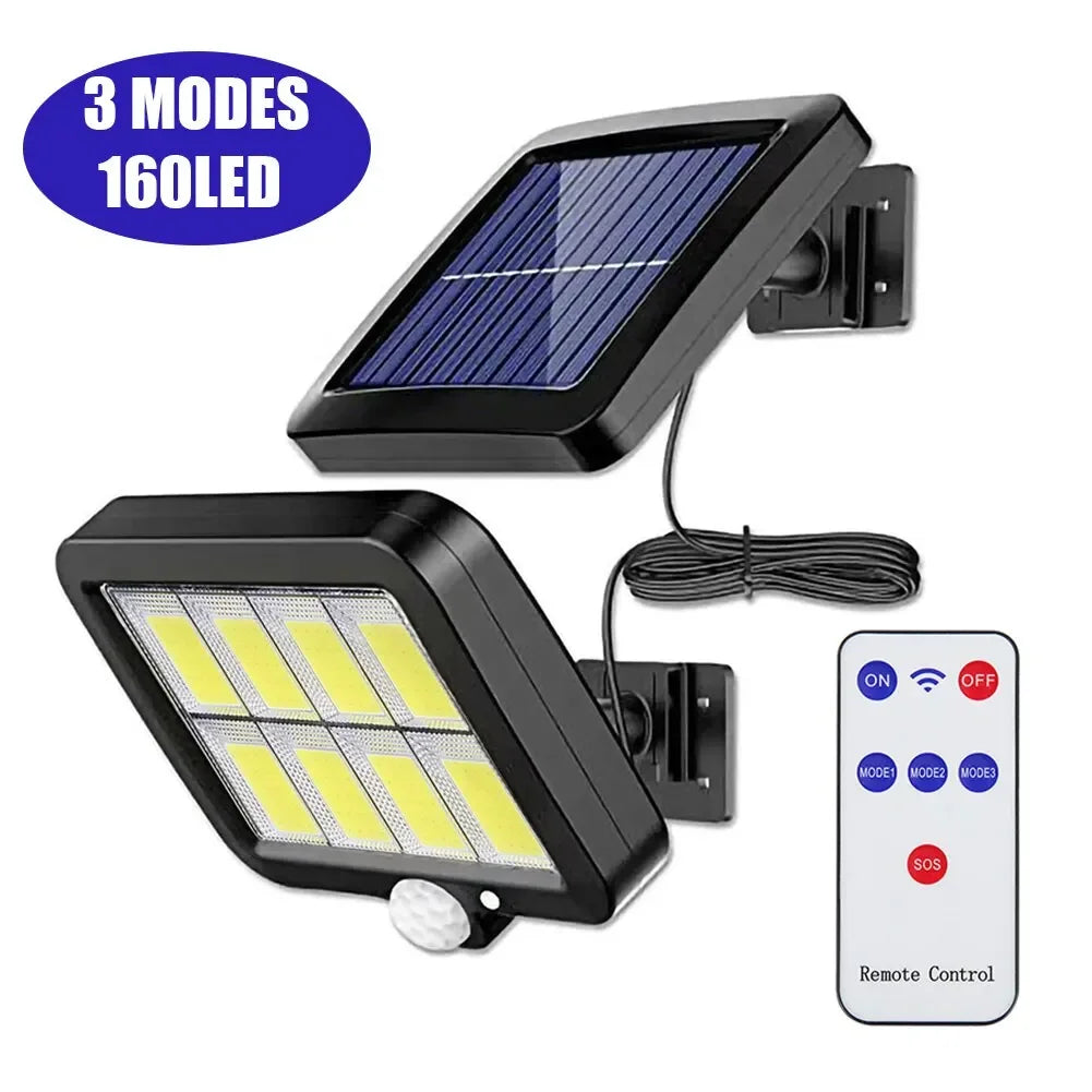 Lumière LED extérieure noire à capteur solaire avec panneau et télécommande.