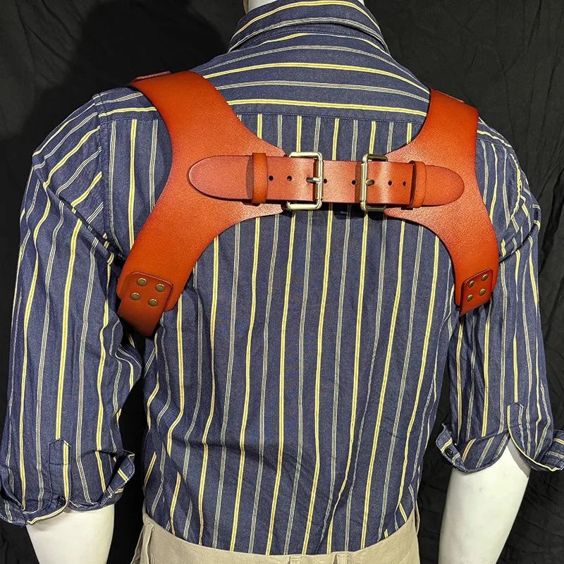 Men's double shoulder leather suspenders worn over a blue striped shirt.