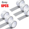 Grey reusable window repair tape in 6 pieces rolled on a transparent backing