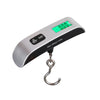 A digital hanging luggage scale with a green display showing 0.00 kg and a metal hook.