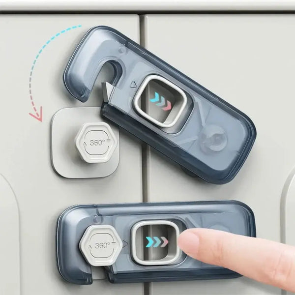 A hand is shown operating a clear plastic safety lock set for a cabinet, demonstrating its use.