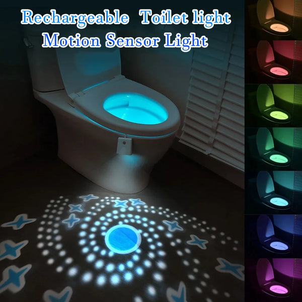 A rechargeable toilet light with a motion sensor illuminating the interior of a white toilet bowl and surrounding area.