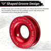 A close-up view of a red U shaped groove design synthetic rope and soft shackle