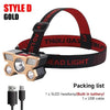 A red and black Style D Gold headlamp with a light panel and an included USB cable.