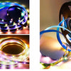 Close-up view of addressable RGBW LED strip lights, showing various curved and circular light patterns.