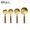 Four stainless steel measuring spoons with wooden handles.