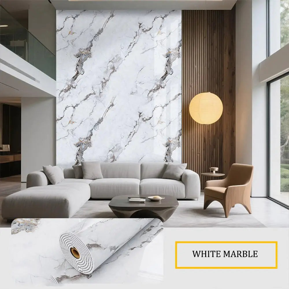 A modern living room featuring a light gray sofa, wooden paneling, and a white marble accent wall.