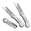 A set of three silver folding utility knives with quick change blades shown in various angles.