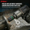 A hand is using a Hi-Spec CR-V impact wrench to loosen rusted nuts on a metal rod.
