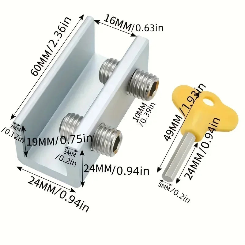 A white sliding window sash lock stopper with various sized mounting holes and a yellow plastic tool.