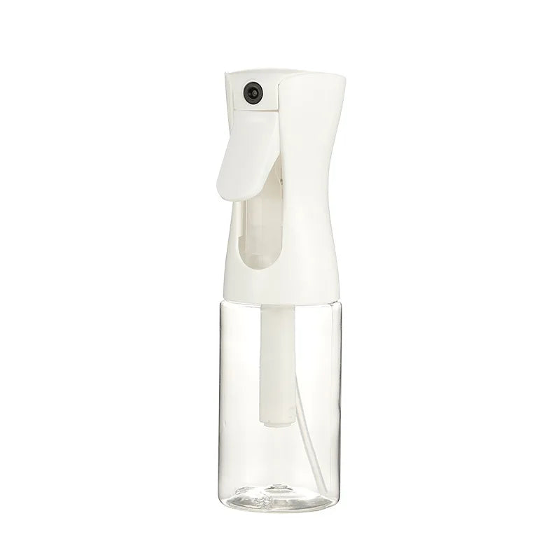 A white high-pressure mist spray bottle with a clear reservoir and a nozzle, designed for hair and makeup.