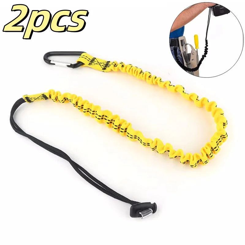 Two yellow elastic tow ropes with black handles and clips for mountain biking