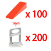 A set of red tile leveling strips and clear spacers for professional tile work.