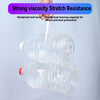 Clear plastic window sealing tape being held by a hand, demonstrating strong viscosity and stretch resistance.