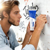 A man applies Wall Repair Paste to a white wall, demonstrating the professional drywall repair kit.