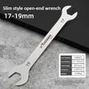 A silver slim style open-end wrench measuring 17-19mm, shown against a gray background.