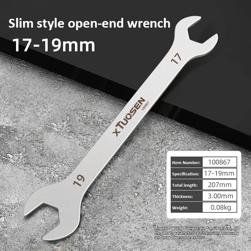 A silver slim style open-end wrench measuring 17-19mm, shown against a gray background.