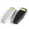 A portable EMF radiation detector device shown in gray and black, displaying a color-coded scale.